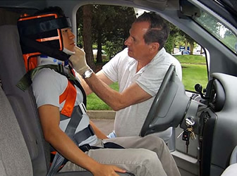 Immobilising a casualty in car using the Oregon Spine Splint II